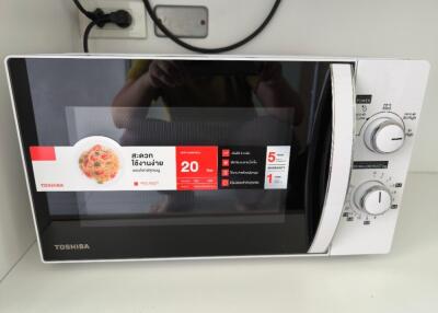 Microwave oven on a kitchen counter