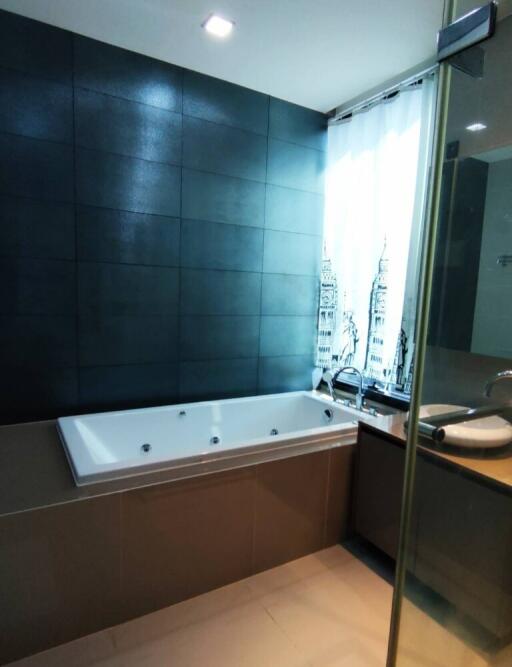 Modern bathroom with a bathtub and sink