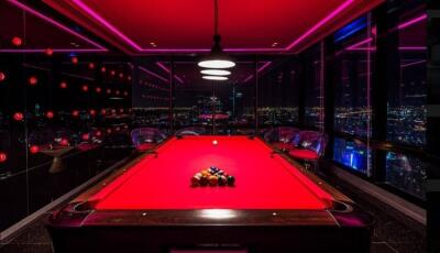 Modern recreational room with pool table and city view