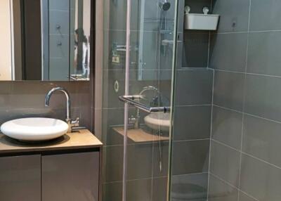 Modern bathroom with glass shower enclosure