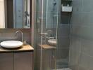 Modern bathroom with glass shower enclosure