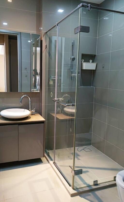 Modern bathroom with glass shower enclosure