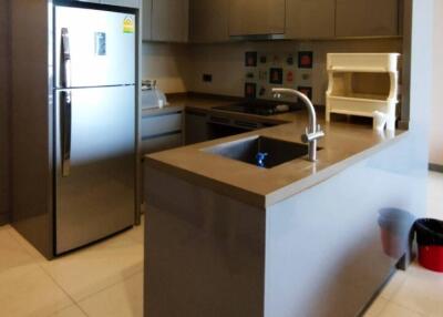 Modern kitchen with stainless steel appliances and sleek cabinetry