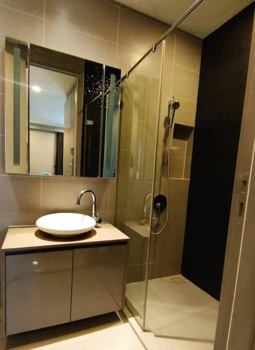 Modern bathroom with shower and vanity