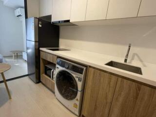 Modern kitchen with appliances and wooden cabinets