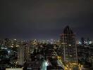 Night view of cityscape with tall buildings