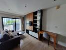 Modern living room with desk and TV