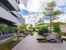 Modern building courtyard with greenery and water features