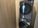 Stacked washer and dryer in laundry room