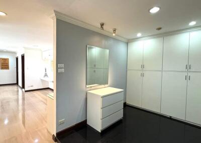 Modern dressing area with built-in cabinets