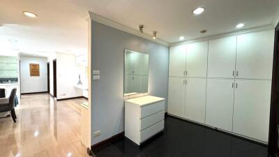 Modern dressing area with built-in cabinets