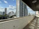 High-rise balcony with city skyline view