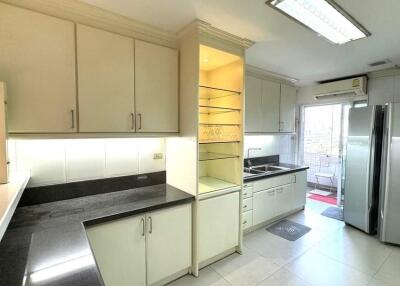 Modern kitchen with granite countertops and stainless steel appliances