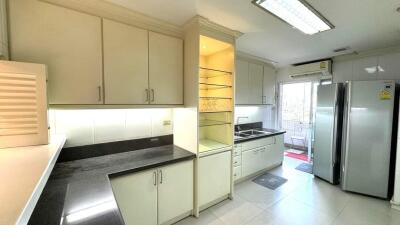 Modern kitchen with granite countertops and stainless steel appliances