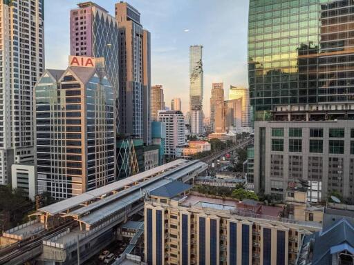 Panoramic view of city skyline with various high-rise buildings