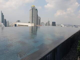 Infinity pool with city skyline view