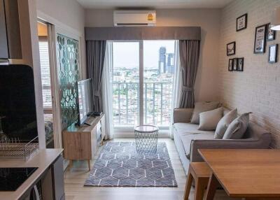 Modern living room with city view and minimalistic decor