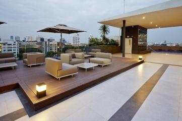 Rooftop lounge area with city view