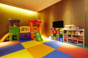 Bright and colorful playroom with toys and play structures