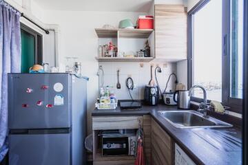 Well-organized modern kitchen with appliances and storage