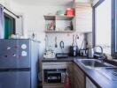 Well-organized modern kitchen with appliances and storage