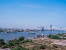 Scenic cityscape with river and buildings