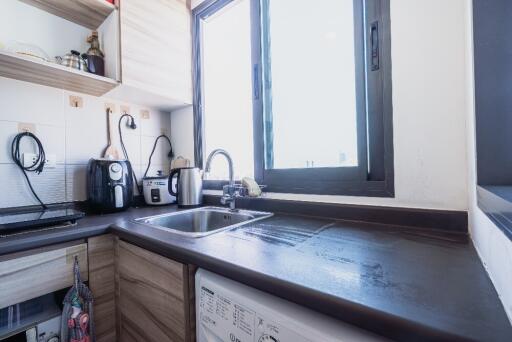 Modern kitchen with window and appliances