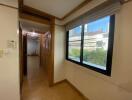 Hallway with window and view to an external building