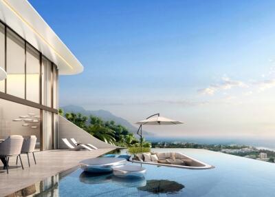 Luxury outdoor infinity pool with lounging area and stunning ocean view