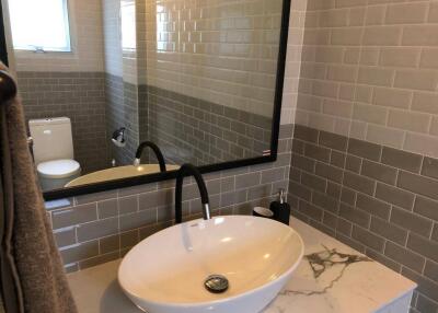 Modern bathroom with sink and toilet