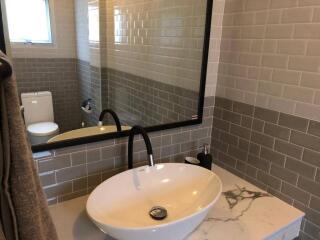 Modern bathroom with sink and toilet