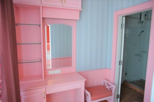 Bedroom with dressing table and chair