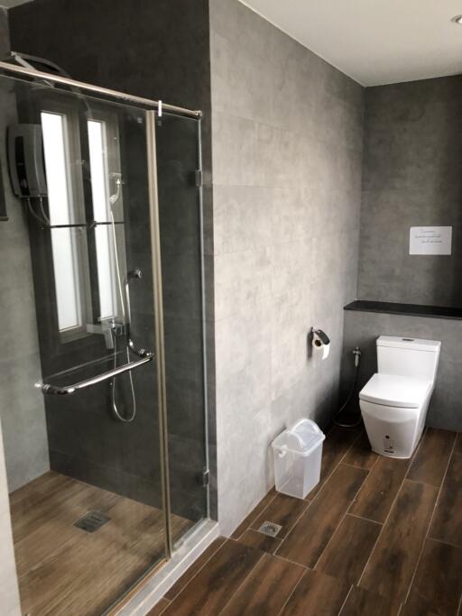 Modern bathroom with shower and toilet