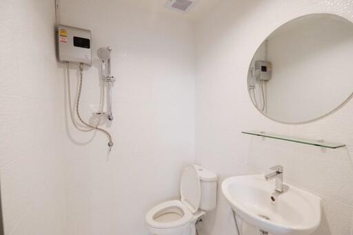 Clean white bathroom with modern fixtures