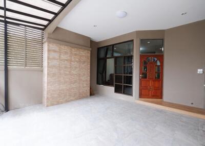 Modern house entryway with covered porch