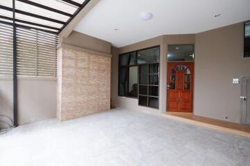 Modern house entryway with covered porch