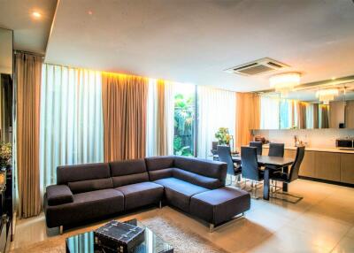 Spacious and modern living-dining room with natural light