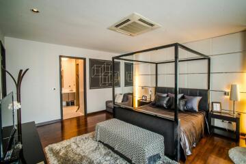 Modern bedroom with a four-poster bed