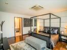 Spacious bedroom with modern decor and ensuite bathroom