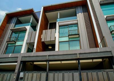 Modern multi-story residential building with balconies