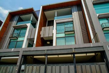 Modern multi-story residential building with balconies