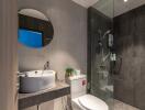 Modern bathroom with shower and round mirror