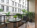 balcony with table and plants