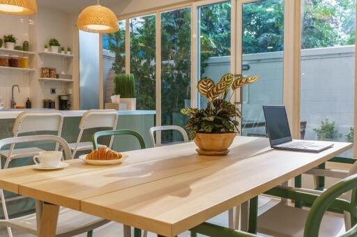 Modern dining area with large windows