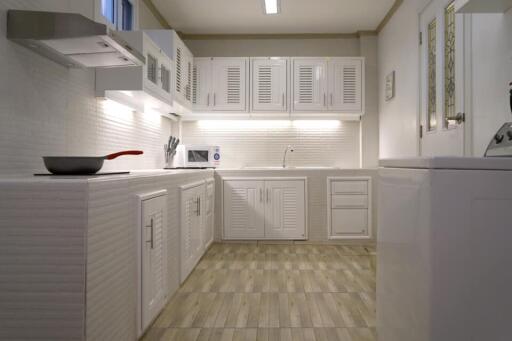 Modern kitchen with white cabinets