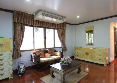 Spacious living room with classic furniture and natural light