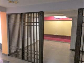 Hallway with wooden lattice partition