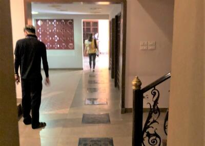 A view of the hallway leading to different rooms