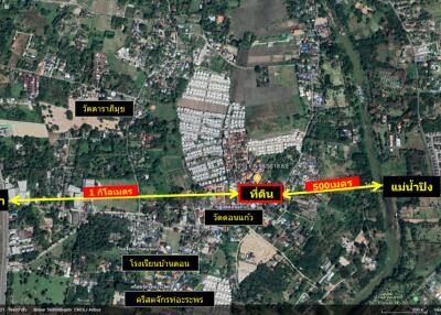 Aerial view of a plot of land with surrounding areas and marked distances