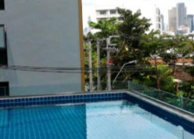 Outdoor swimming pool with city views